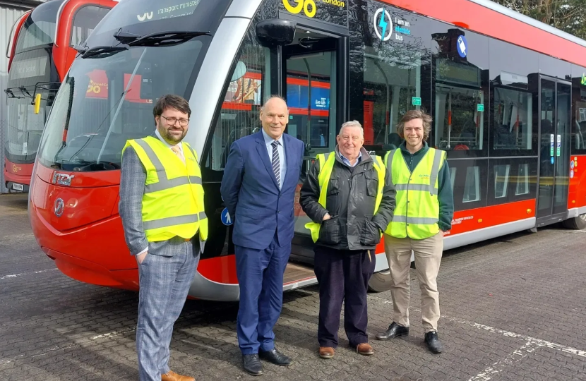 Thomas and Councillors seeing the new bus