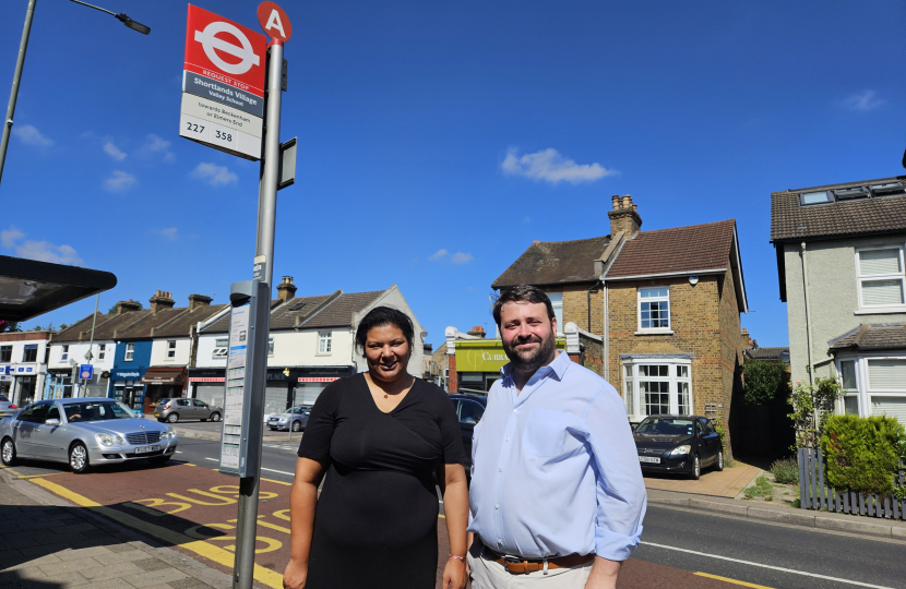 Cllr Gemma Turrell and Thomas Turrell AM at the bus stop 