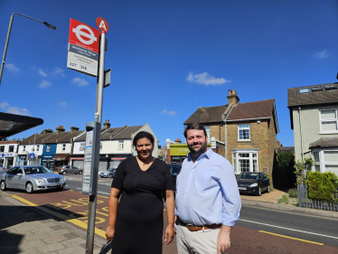 Cllr Gemma Turrell and Thomas Turrell AM at the bus stop 